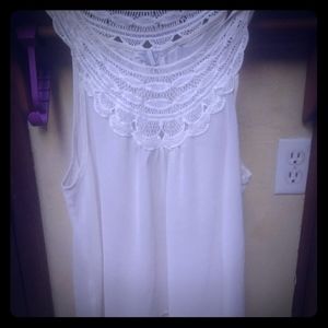 Sheer off-white sleeveless blouse